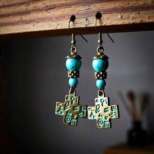 2/$25! Symbols Numerology - Aqua Howlite + Patina Painted Bronze Cross Earrings